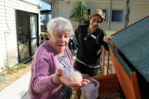 Women with chicken egg