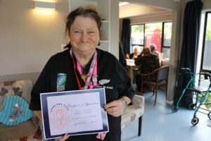 Woman with certificate