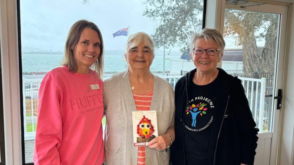 Ambridge Rose team with The Youth Project team celebrating the creativity of young students